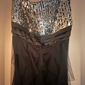 Strapless semi formal dress with black skirt